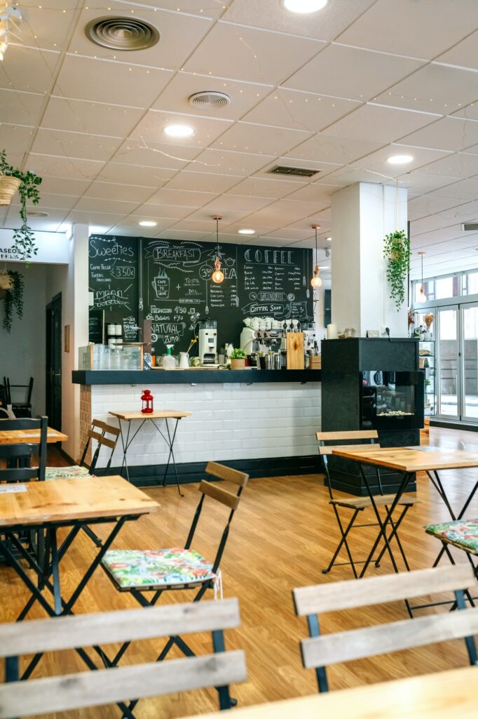 Empty cafe interior with chairs and tables.jpg