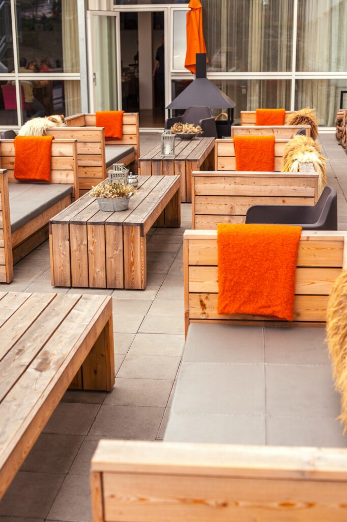 Outdoor restaurant terrace with wooden furniture.jpg