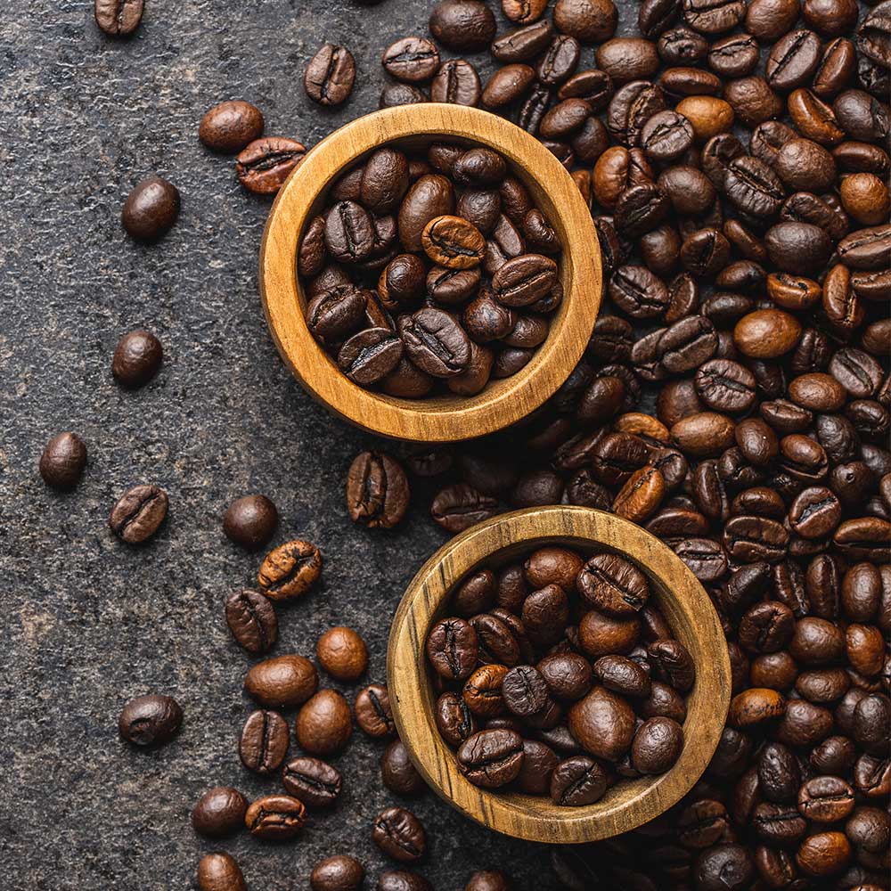 Roasted coffee beans in wooden bowl harmwe4.jpg